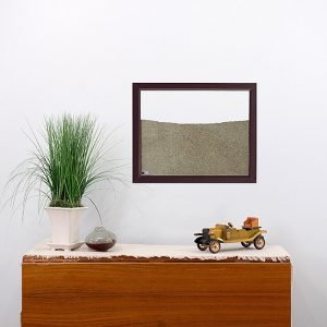 brown painted wood frame ant farm hanging on wall